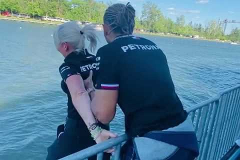 Watch Lewis Hamilton push Mercedes physio into river after she bet against seven-time F1 champ at Canadian GP