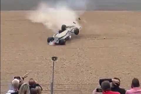 Watch terrified spectators run for their lives as Zhou Guanyu’s car rolls upside down towards them at British GP