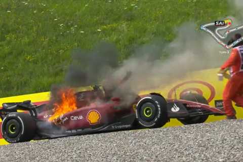 Carlos Sainz’s Ferrari bursts into flames with driver still inside before he dramatically bails out at Austrian GP