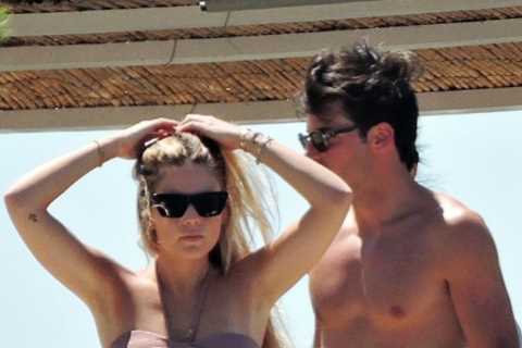 F1 ace Carlos Sainz Jr relaxes on holiday as stunning girlfriend Isabel Hernaez enjoys the sun in bikini on season break