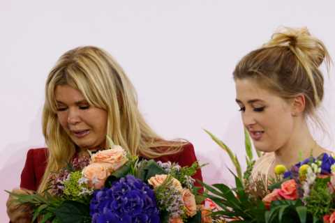 Michael Schumacher’s wife Corinna breaks down in tears on stage as F1 legend is honoured in an emotional ceremony