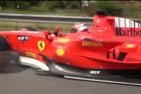 Watch bizarre moment mystery FORMULA 1 car spotted racing down motorway after driver escaped ban for same stunt before
