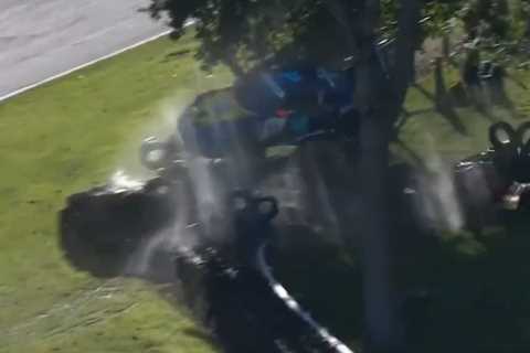 Heart-stopping moment race driver’s £170k Porsche flies through air at 100mph and almost crushes marshal in huge crash