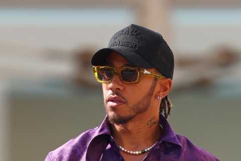Lewis Hamilton returns to Abu Dhabi a year on from Max Verstappen F1 title chaos in incredible all-purple ensemble