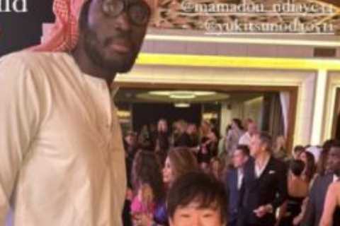 F1 fans in hysterics after 5ft 3inch driver Yuki Tsunoda poses alongside basketball star… who is TWO FOOT taller
