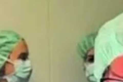 Ex-Formula 1 champ looks unrecognisable in operating theatre as he considers ‘exciting’ new career as brain surgeon