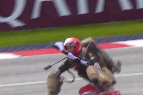 Bizarre moment man hovering over Austrian GP in jet pack CRASHES on track leaving F1 star and commentators in shock