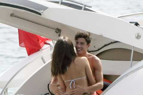 MotoGP star Marc Marquez can’t keep his hands off bikini-clad model girlfriend on yacht in Majorca